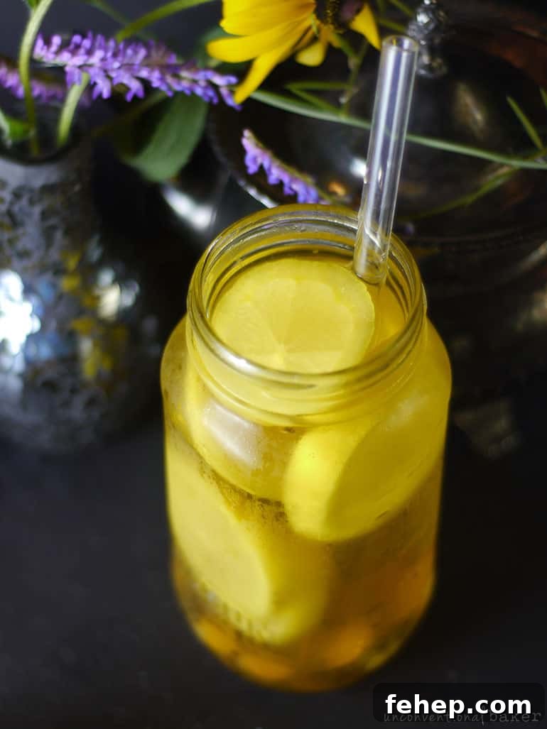 Refreshing Turmeric Lemonade Recipe with Ginger and Honey 3 turmeric and lemon infused water
