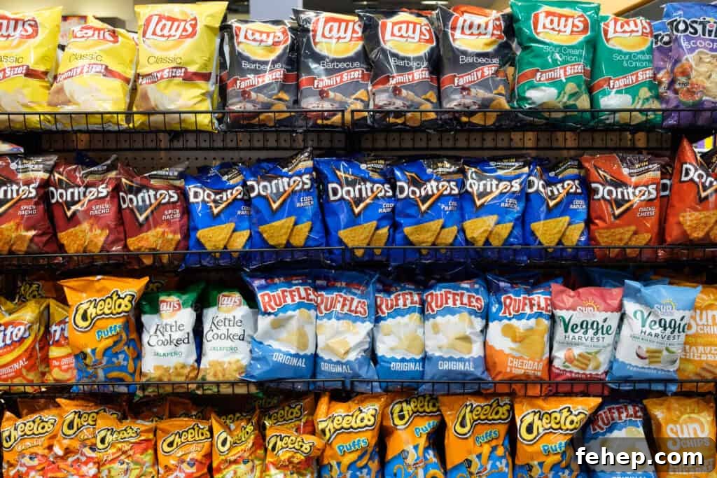 45+ Gluten-Free Gas Station Snacks to Grab on the Go 2 bags of chips on a display.