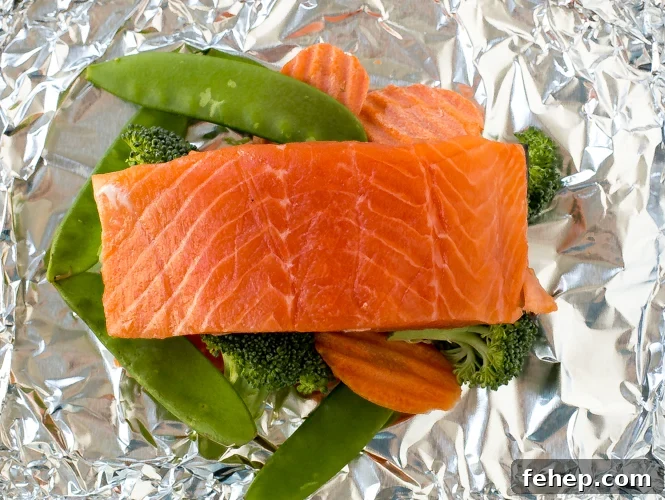 Baked Salmon and Veggies in Foil | chefsavvy.com Baked Salmon and Veggies in Foil