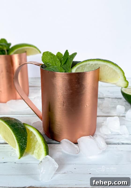 How to Make a Classic Moscow Mule: Ginger, Lime & Vodka Recipe 2 Two Moscow Mules in copper mugs