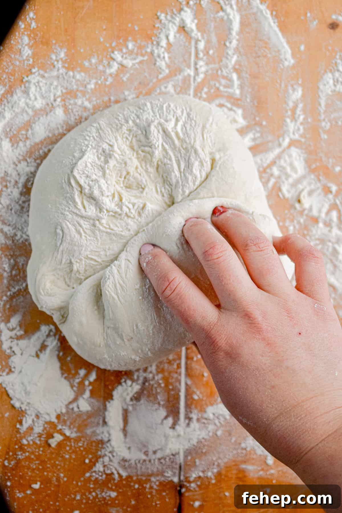 The bread dough is being shaped.