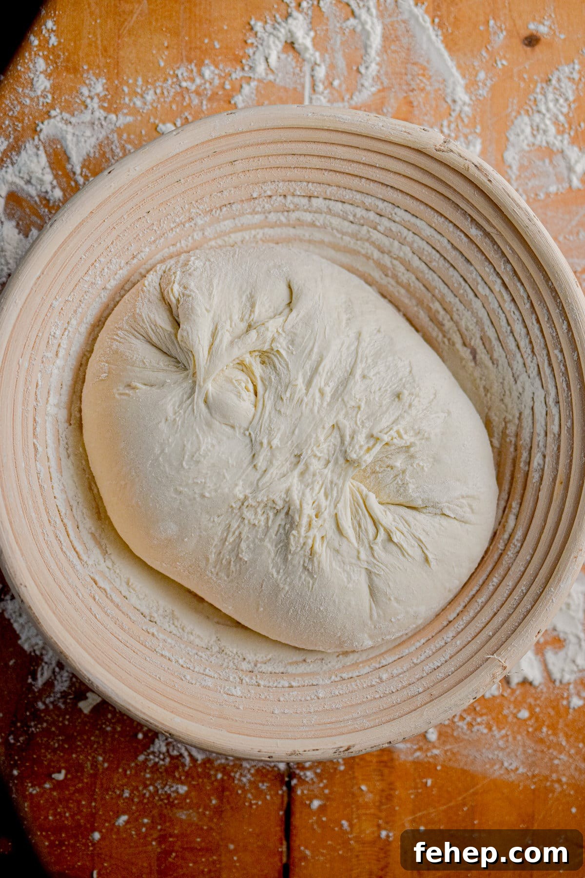 The bread dough is in a banneton.