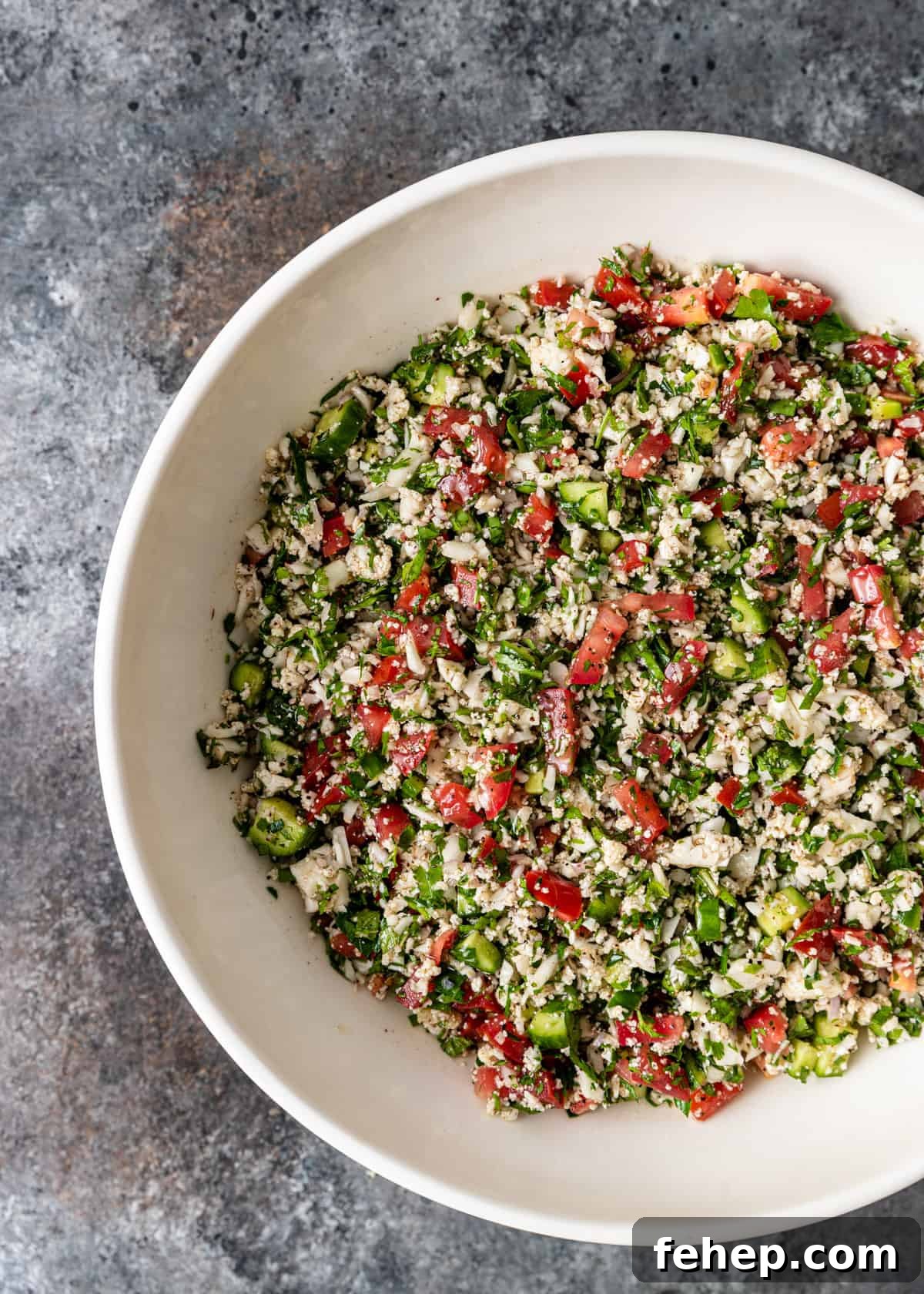 Cauliflower Tabbouleh Salad with Fresh Herbs and Lemon Vinaigrette 8 overhead: large bowl of cauliflower tabbouleh