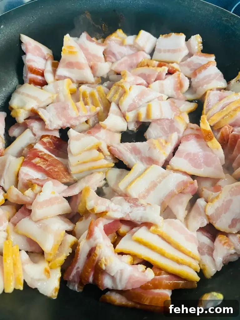 bacon in a skillet before cooking
