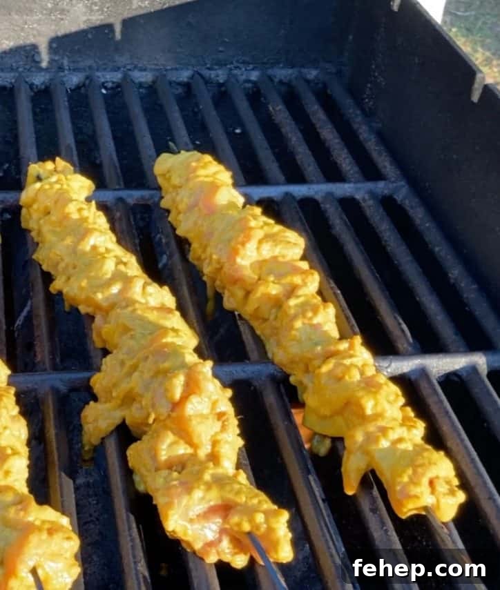 peanut sauce chicken skewers on grill