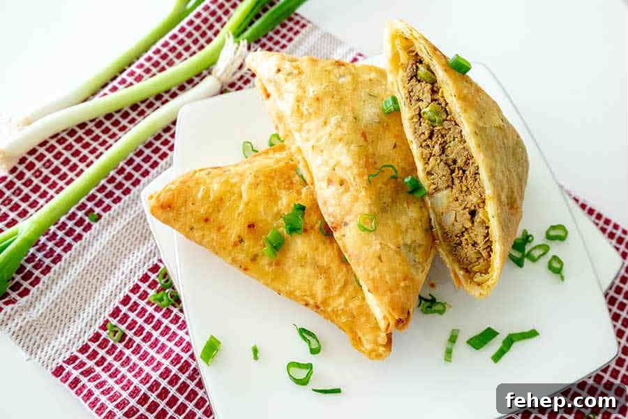 26 Addictive Gluten-Free Game Day Recipes Fans Devour 11 gluten free samosa cut in half on a plate for game day