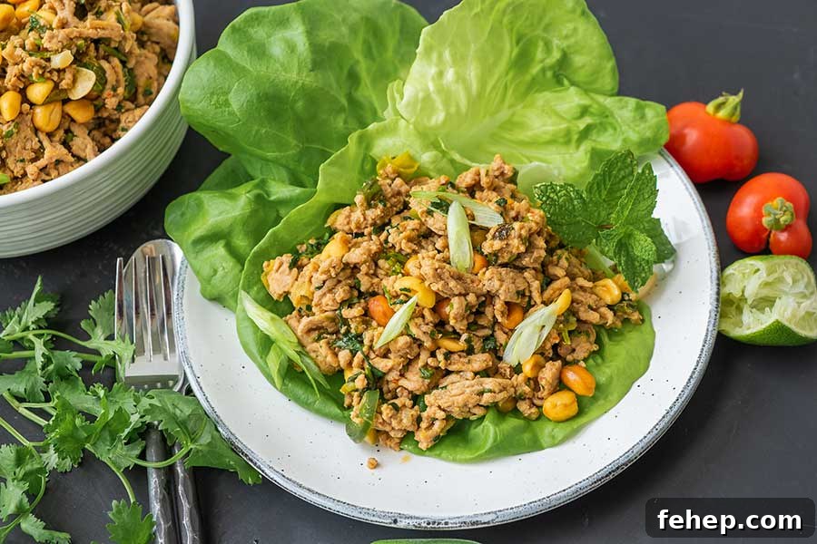 26 Addictive Gluten-Free Game Day Recipes Fans Devour 21 chicken lettuce wrap on a plate