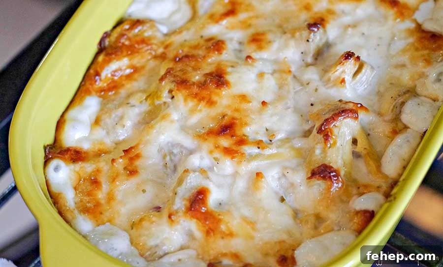 26 Addictive Gluten-Free Game Day Recipes Fans Devour 7 hot artichoke dip in a small casserole dish