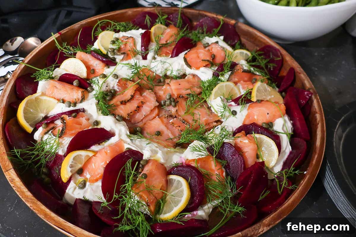 26 Addictive Gluten-Free Game Day Recipes Fans Devour 9 Scandinavian-style smoked salmon dip topped with roasted beets, fresh dill, and lemon slices on a serving platter — a colorful gluten-free appetizer.