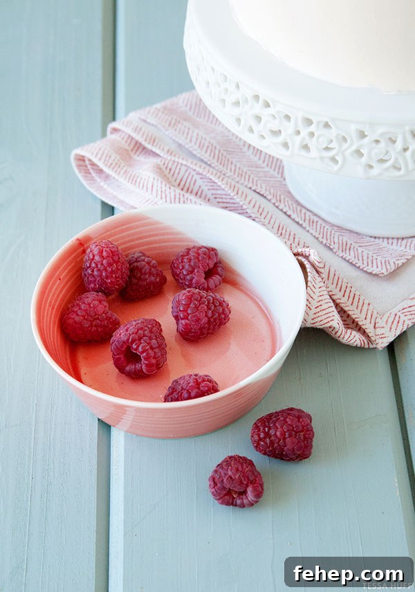 Raspberry and Blood Orange Layer Cake Recipe 3 fresh raspberries and a blood orange glaze | Raspberry & Blood Orange Cake| Recipe by Tessa Huff for TheCakeBlog.com
