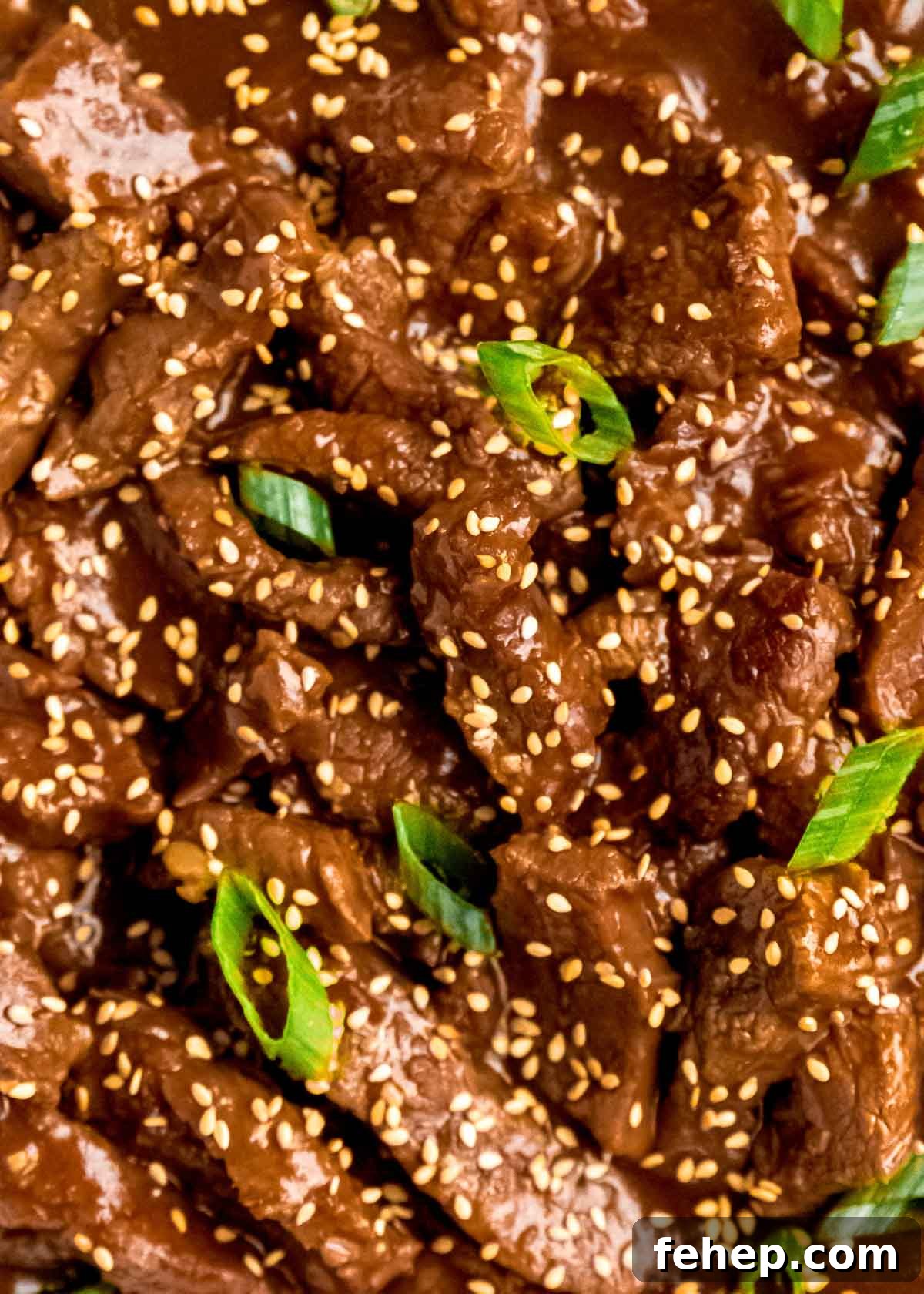 Instant Pot Mongolian Beef Recipe — Tender, Savory Weeknight Meal 8 close up shot of mongolian beef with sesame seeds