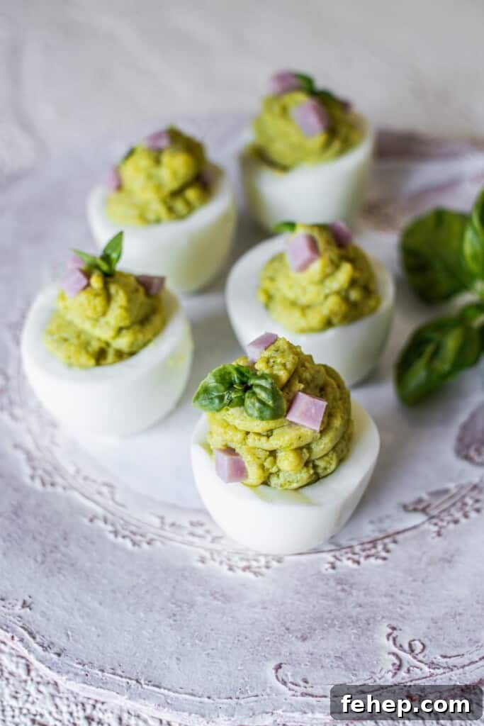 The Deviled Eggs Recipe You’ll Make Again and Again 5 Deviled eggs on light background