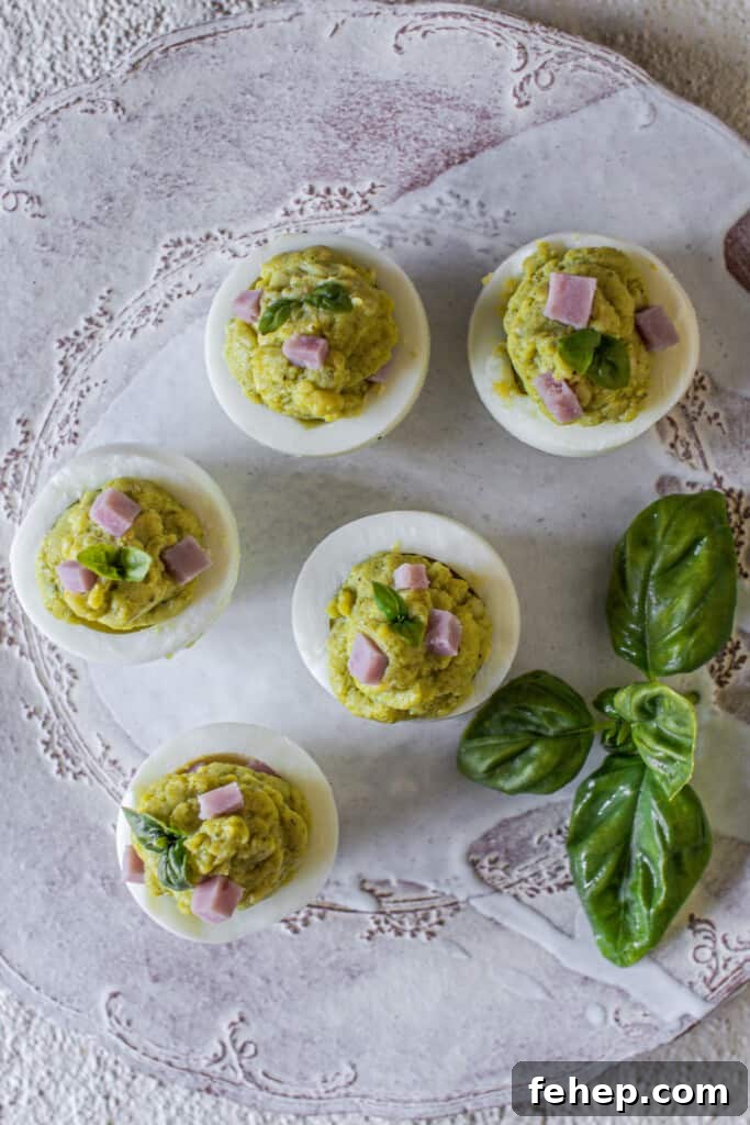 The Deviled Eggs Recipe You’ll Make Again and Again 6 Deviled eggs on light background