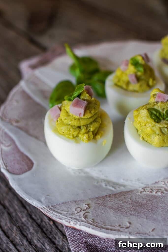 The Deviled Eggs Recipe You’ll Make Again and Again 7 Deviled eggs on light background