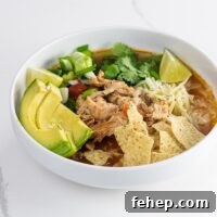 rotisserie chicken tortilla soup in a white bowl