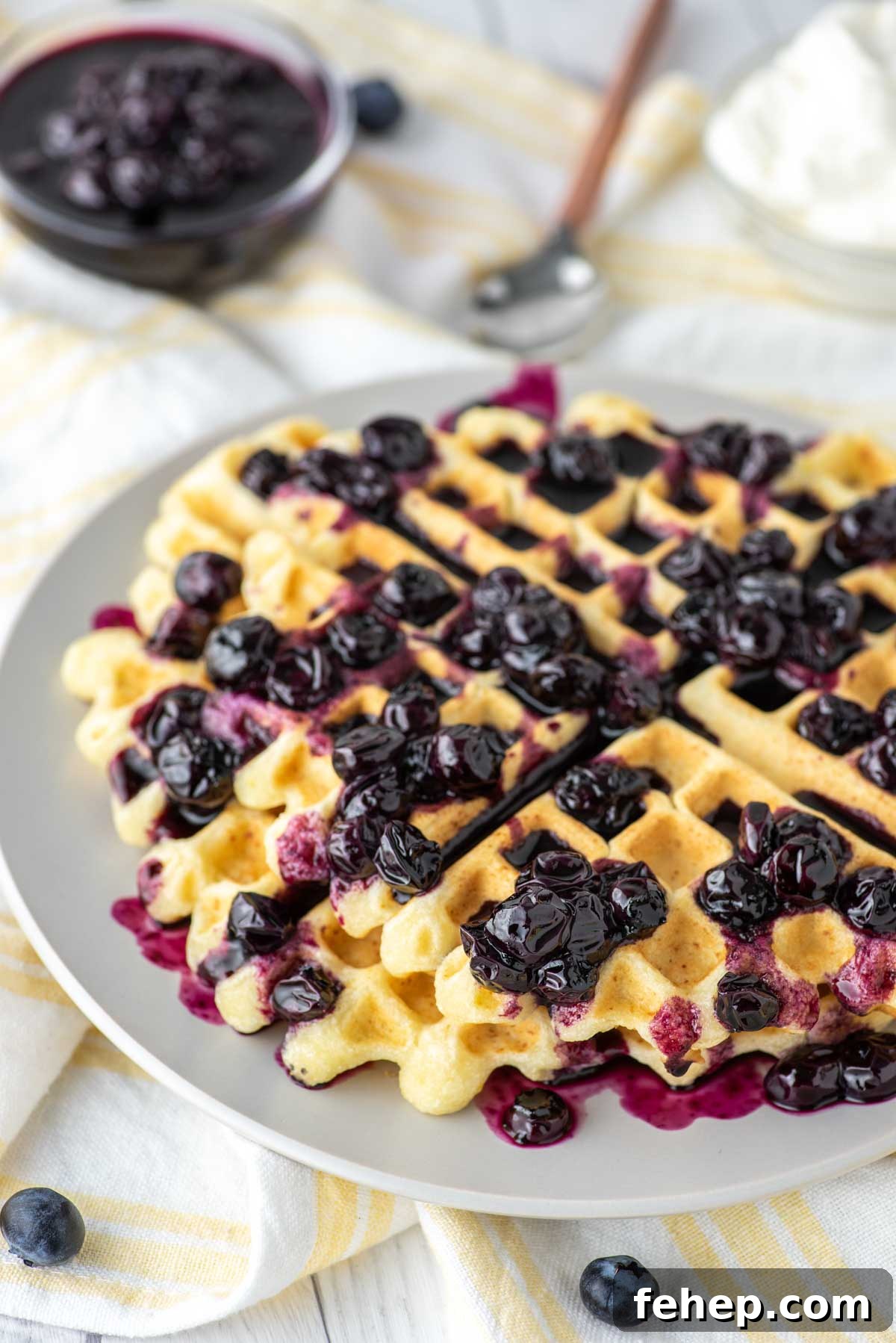 close-up of lemon ricotta waffles on plate