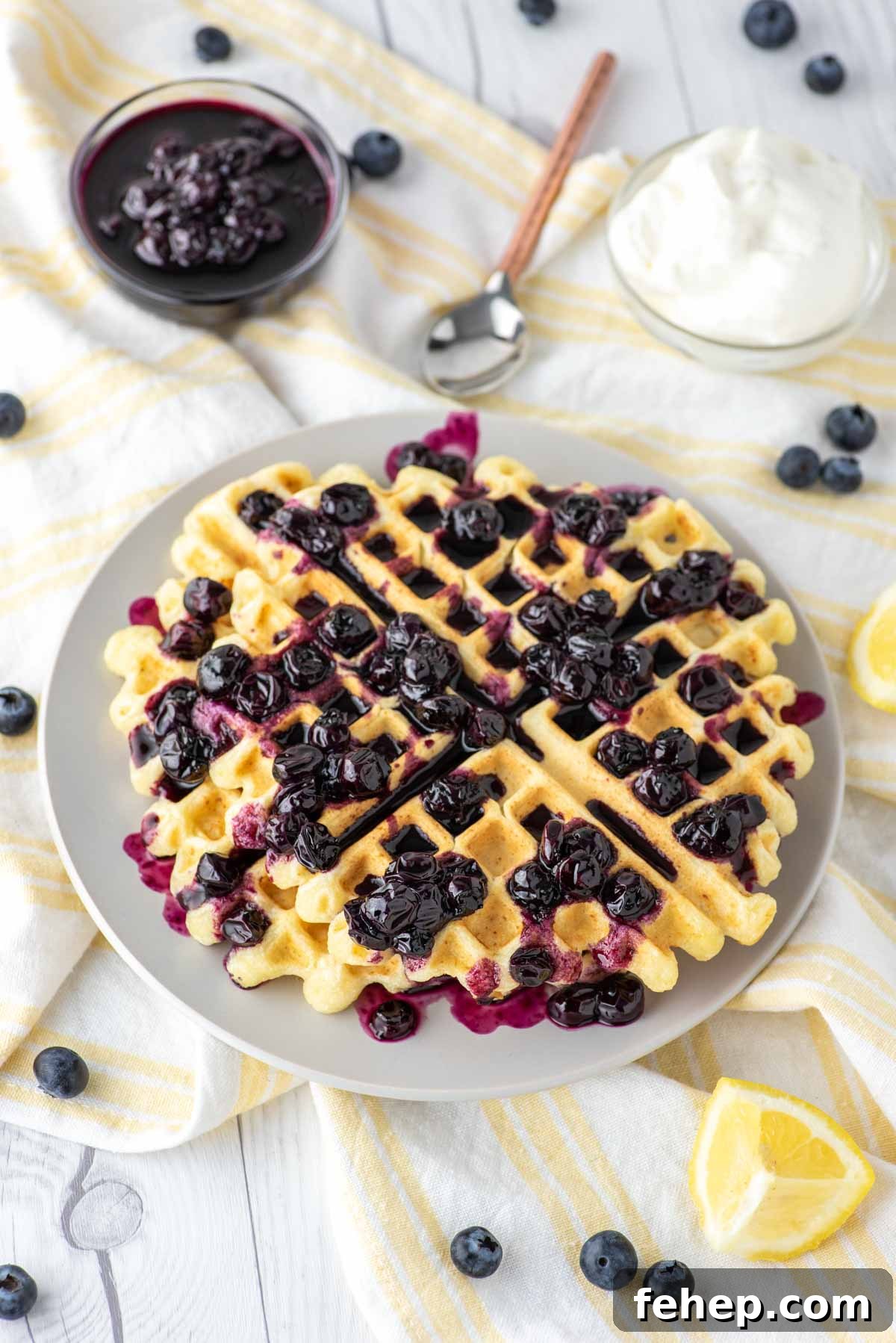 lemon ricotta waffles on dish towel