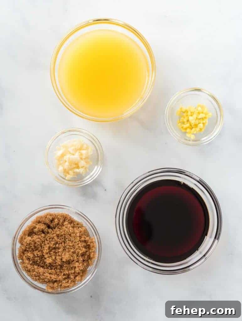 Sticky Teriyaki Cauliflower Bites with Sesame and Scallions 10 5 glass bowls filled with orange juice, garlic, ginger, brown sugar, and soy sauce