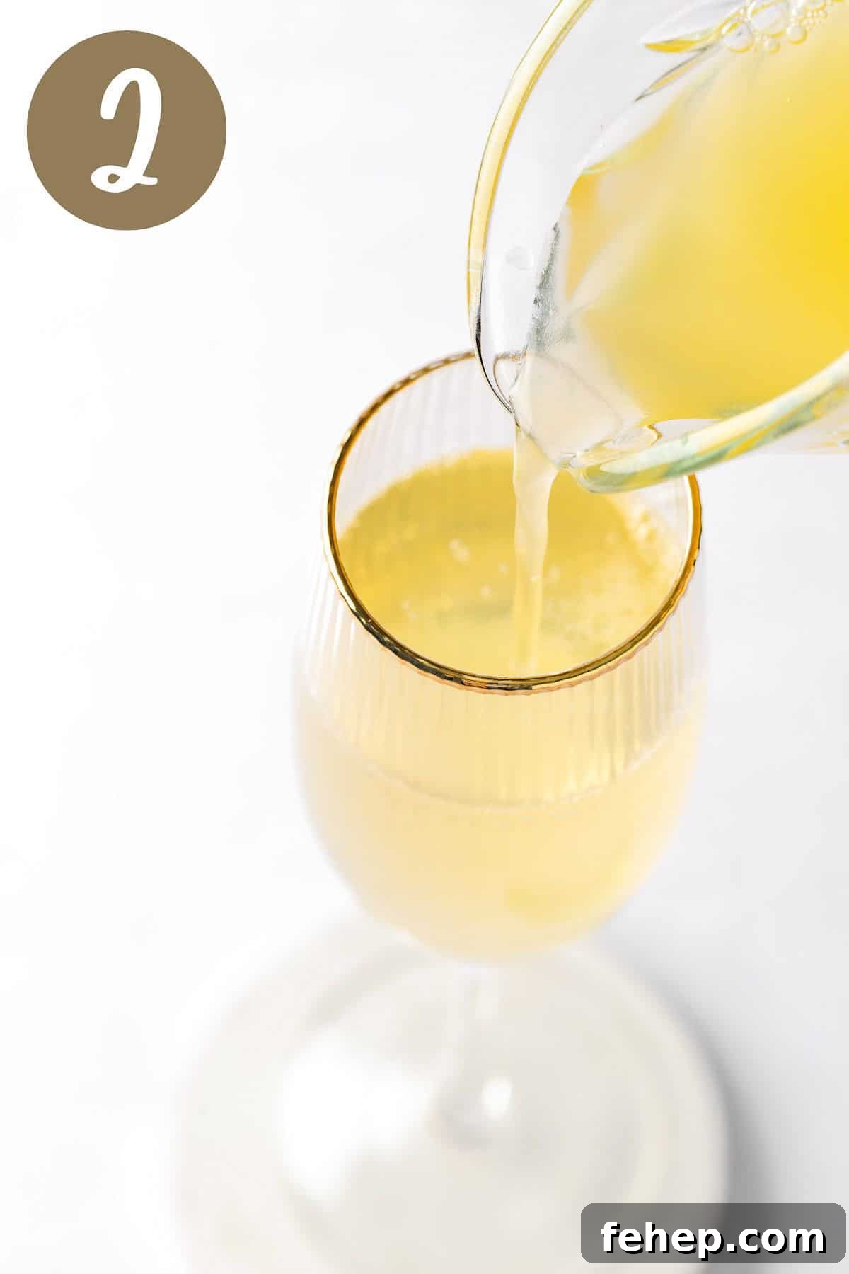 Pineapple Mimosa Cocktail: Tropical Brunch Sparkler 5 A process photo illustrating step 2.