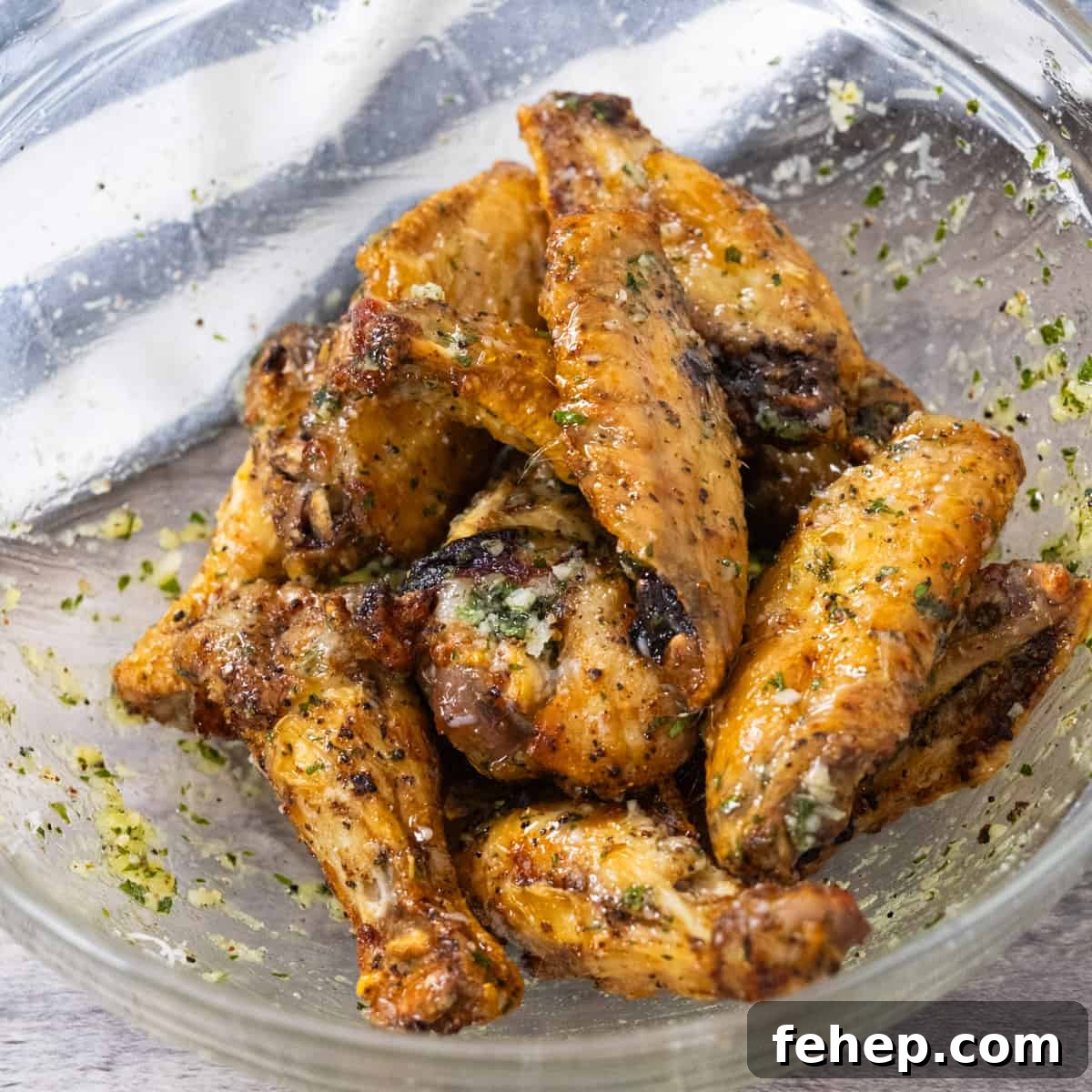Crispy Air Fryer Garlic Parmesan Chicken Wings 7 wings tossed in sauce