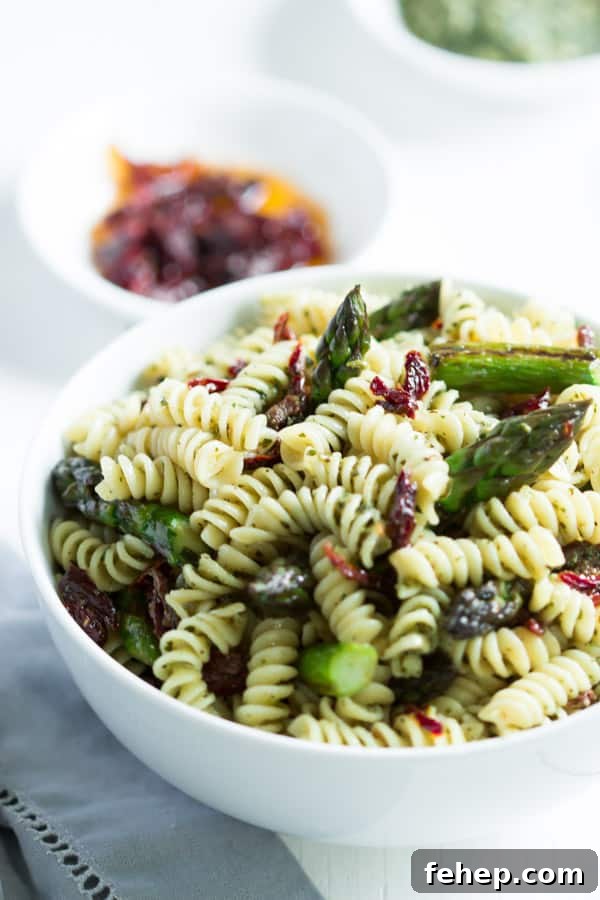 Sausage, Asparagus & Quinoa Pasta Recipe for Weeknights 3 Easy asparagus pasta salad in a white bowl.