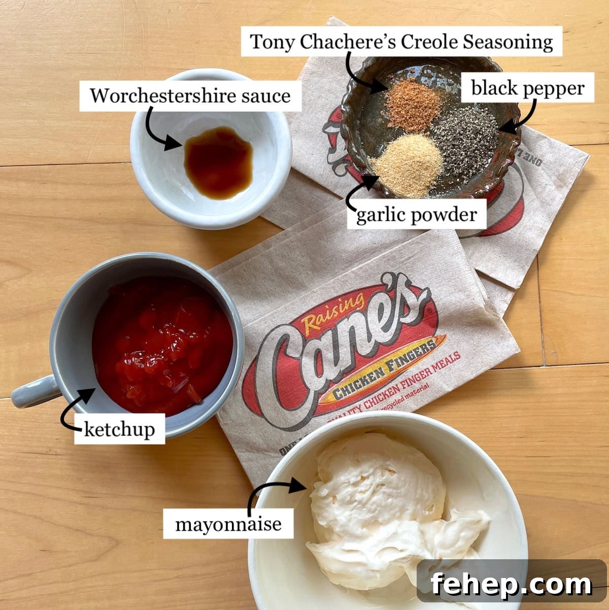 Copycat Raising Cane’s Sauce Recipe: Homemade Cane’s Dipping Sauce 4 A picture of the ingredients in Raising Cane's sauce in small bowls, labeled.