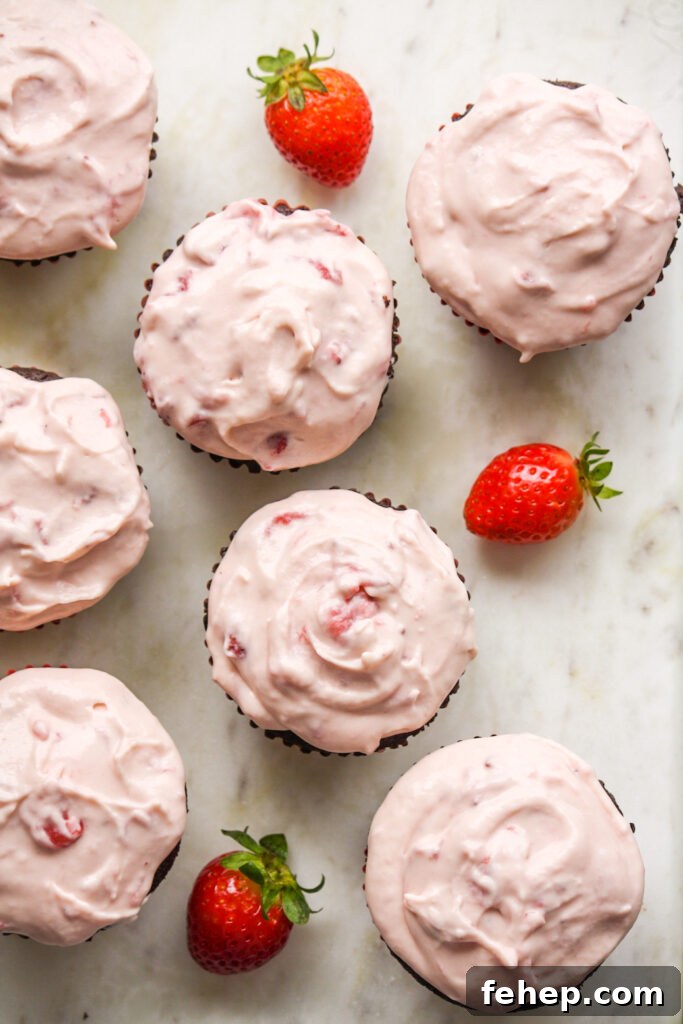 Chocolate Cupcakes with Strawberry Cream Cheese Frosting 3 Soft, dark chocolate cupcakes topped with strawberry compote and cream cheese frosting