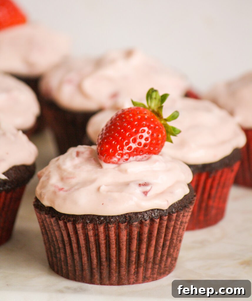 Chocolate Cupcakes with Strawberry Cream Cheese Frosting 4 Soft, dark chocolate cupcakes topped with strawberry compote and cream cheese frosting