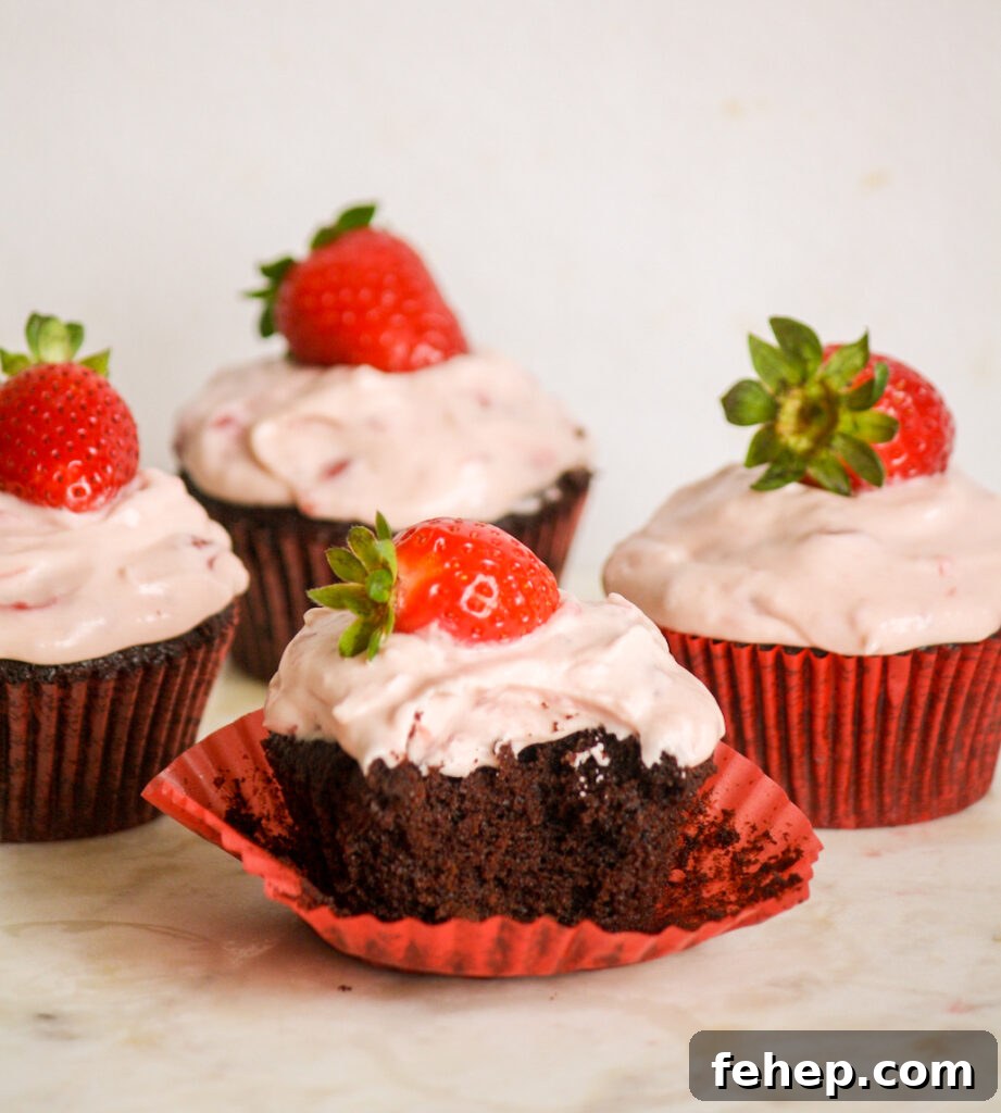 Chocolate Cupcakes with Strawberry Cream Cheese Frosting 5 Soft, dark chocolate cupcakes topped with strawberry compote and cream cheese frosting