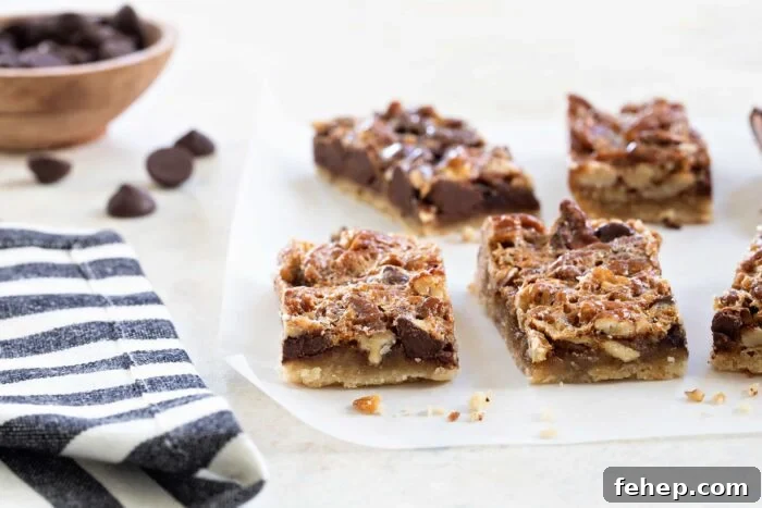 Bourbon Chocolate Pecan Bars Recipe with Gooey Caramel Layers 3 Chocolate Bourbon Pecan Bars are a fun twist on classic pecan pie. Perfect for a crowd!