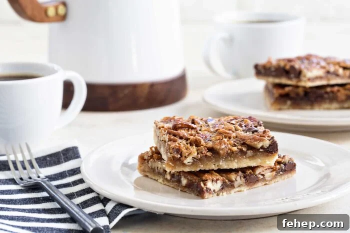 Bourbon Chocolate Pecan Bars Recipe with Gooey Caramel Layers 6 Chocolate Bourbon Pecan Bars are a fun twist on classic pecan pie. This recipe makes 48 bars, so it's perfect for the holidays!