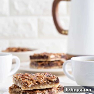 Chocolate Bourbon Pecan Bars are a fun twist on classic pecan pie. They're the perfect bar dessert for the holidays!