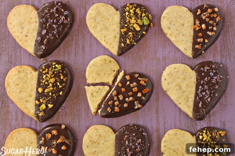Pistachio Shortbread Cookies Pistachio Shortbread Cookies - 9 shortbread cookies displayed in rows of three. One of the cookies is broke into three pieces. | From Sugarhero.com