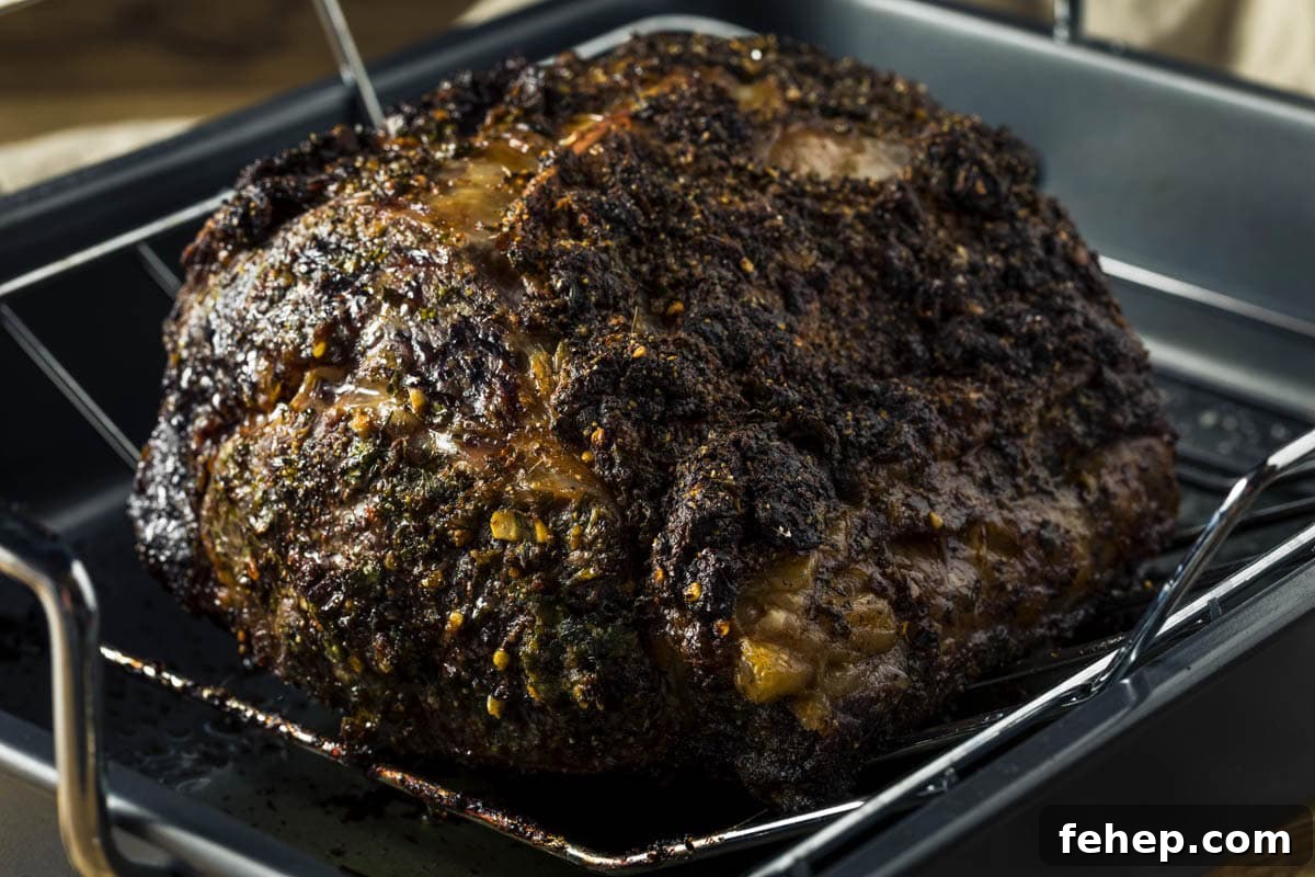 Garlic-Herb Crusted Boneless Prime Rib Recipe 4 a boneless prime rib roast just out of the oven, sitting on a wire rack in a roasting pan