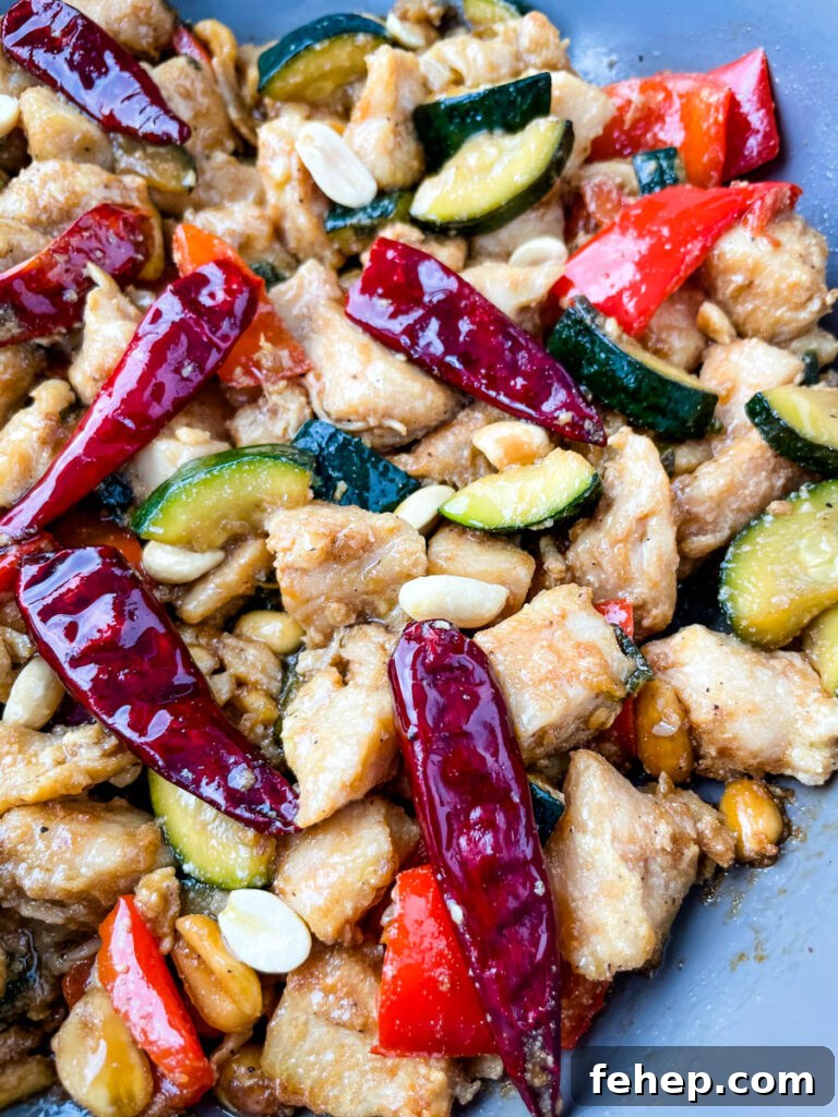 Panda Express copycat kung pao chicken on a skillet pan