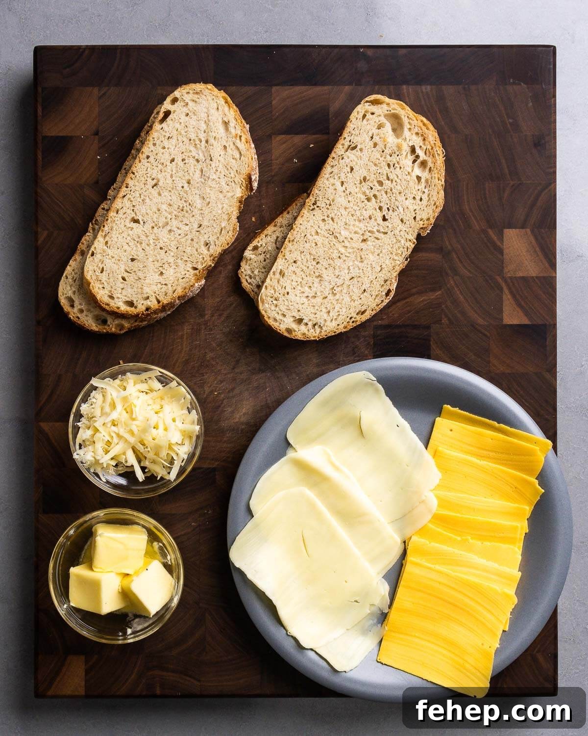 Ingredients shown: sourdough bread, shredded Fontina, mozzarella and American cheese slices, and butter.