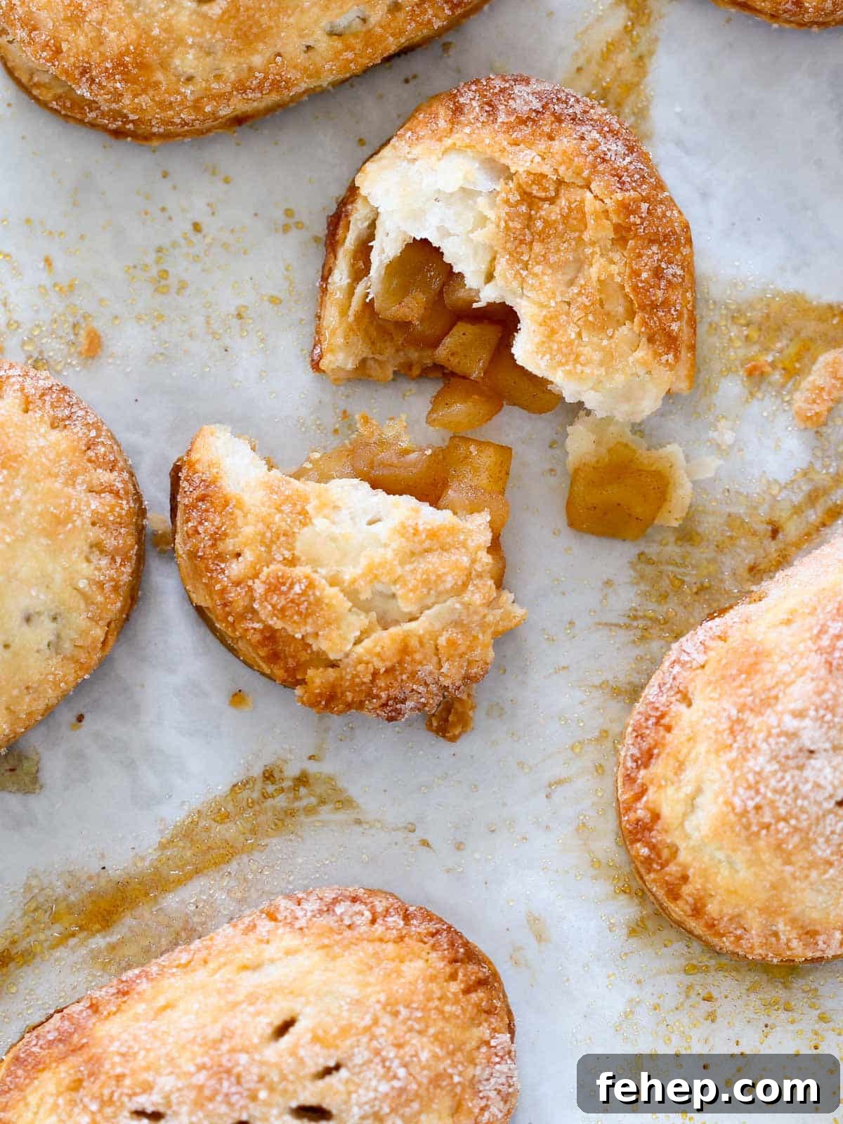 Mini Apple Hand Pies: Flaky Pocket Pies with Cinnamon Filling 2 apple hand pies baked.