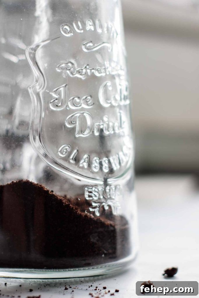 Cold Brew Coffee Concentrate: Ratios, Methods, and Pro Tips 10 mixing the ingredients in a jar