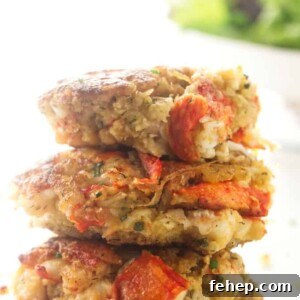 Alaskan King Crab Cakes Recipe: Crispy Pan-Seared Delight 6 Three Alaskan King crab cakes stacked on top of each other.
