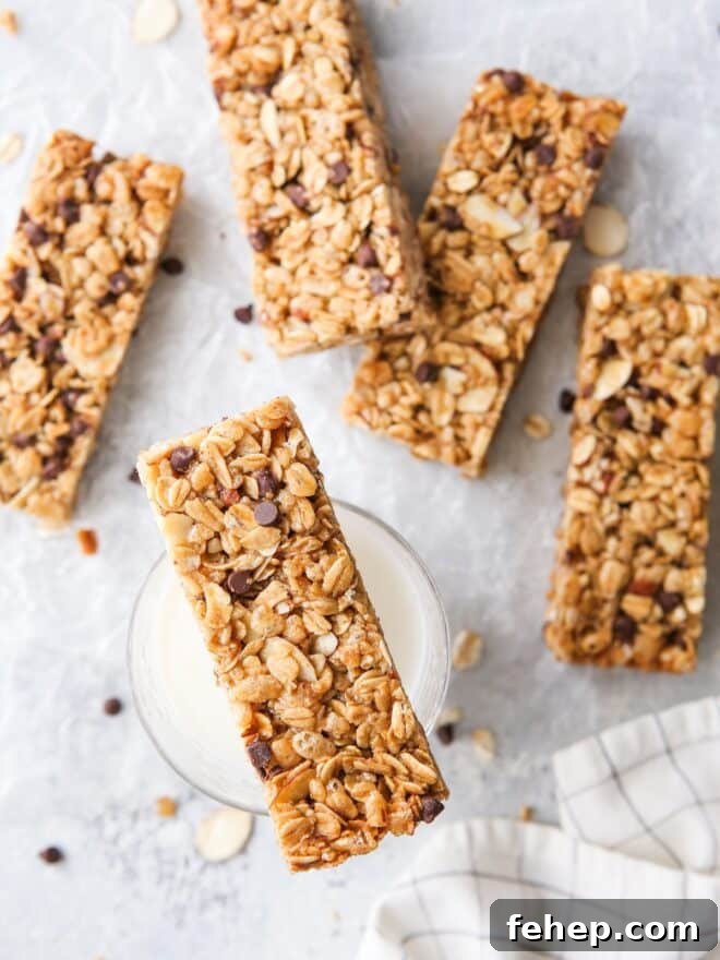 These homemade chewy chocolate chip granola bars are sweet and satisfying, and so much better than store-bought!