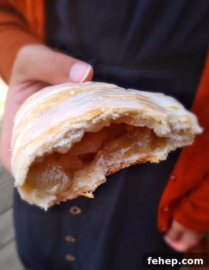 eating an apple fry pie.