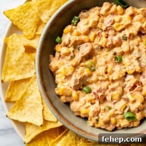 Cream Cheese Corn Dip Recipe for Parties and Game Day 6 Rotel cream cheese corn dip in a bowl surrounded by tortilla chips