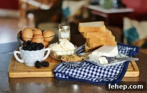 Ingredients for the blackberry grilled cheese are pictured- brown eggs, blackberries, Texas toast, butter, brown sugar, and fontina cheese.