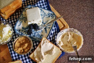 Ingredients of the blackberry grilled cheese on a cutting board with a blue and white gingham napkin.
