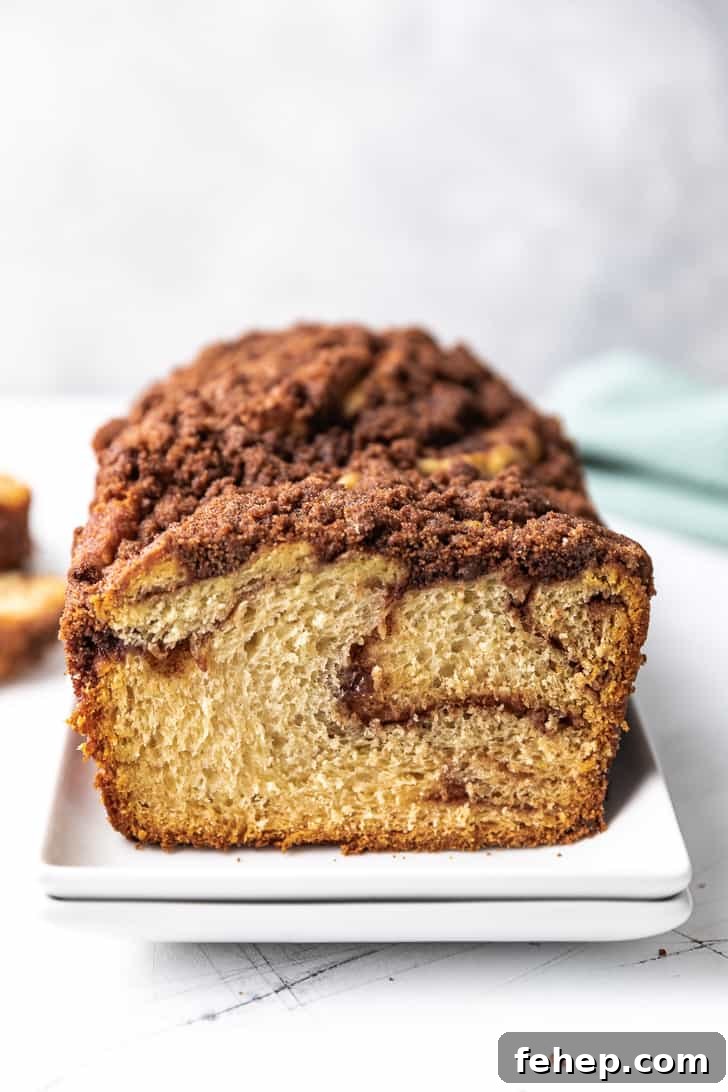 Soft Cinnamon Twist Bread Recipe: Fluffy Swirl Loaf Guide 2 Crunchy cinnamon topping on top of a loaf of bread.