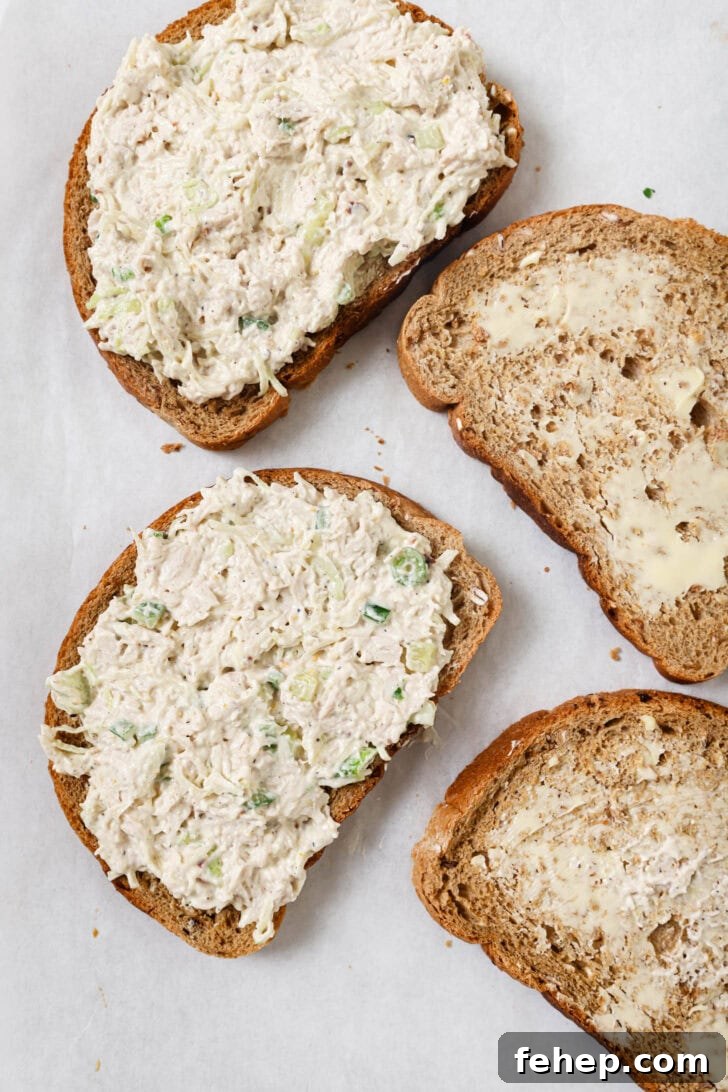 Creamy Chicken Mayo Sandwich Recipe for Balanced Flavor 15 Chicken filling spread on buttered multigrain bread.