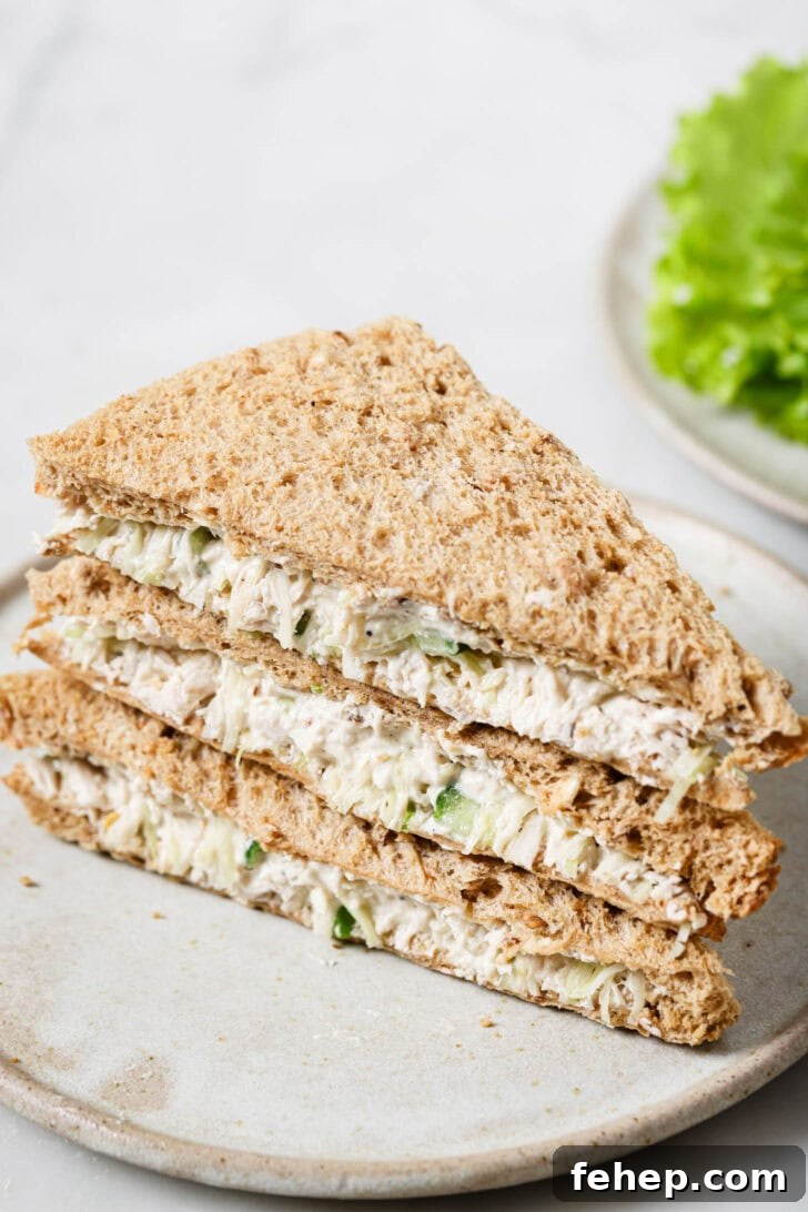 Creamy Chicken Mayo Sandwich Recipe for Balanced Flavor 19 Stack of Chicken Mayo Sandwiches on a plate.