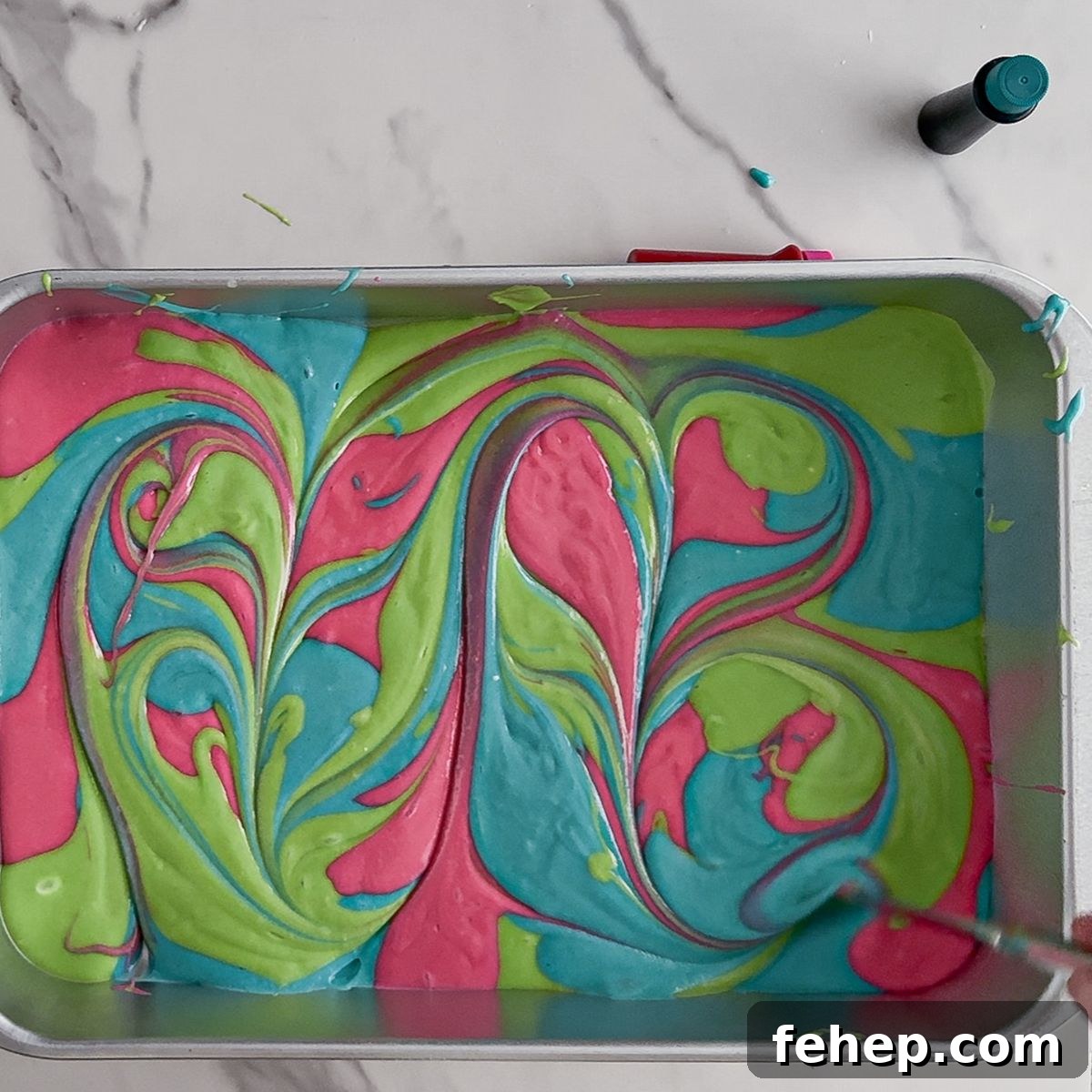Swirling the batter for Easter Poke cake.