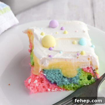 Slice of Easter poke cake.