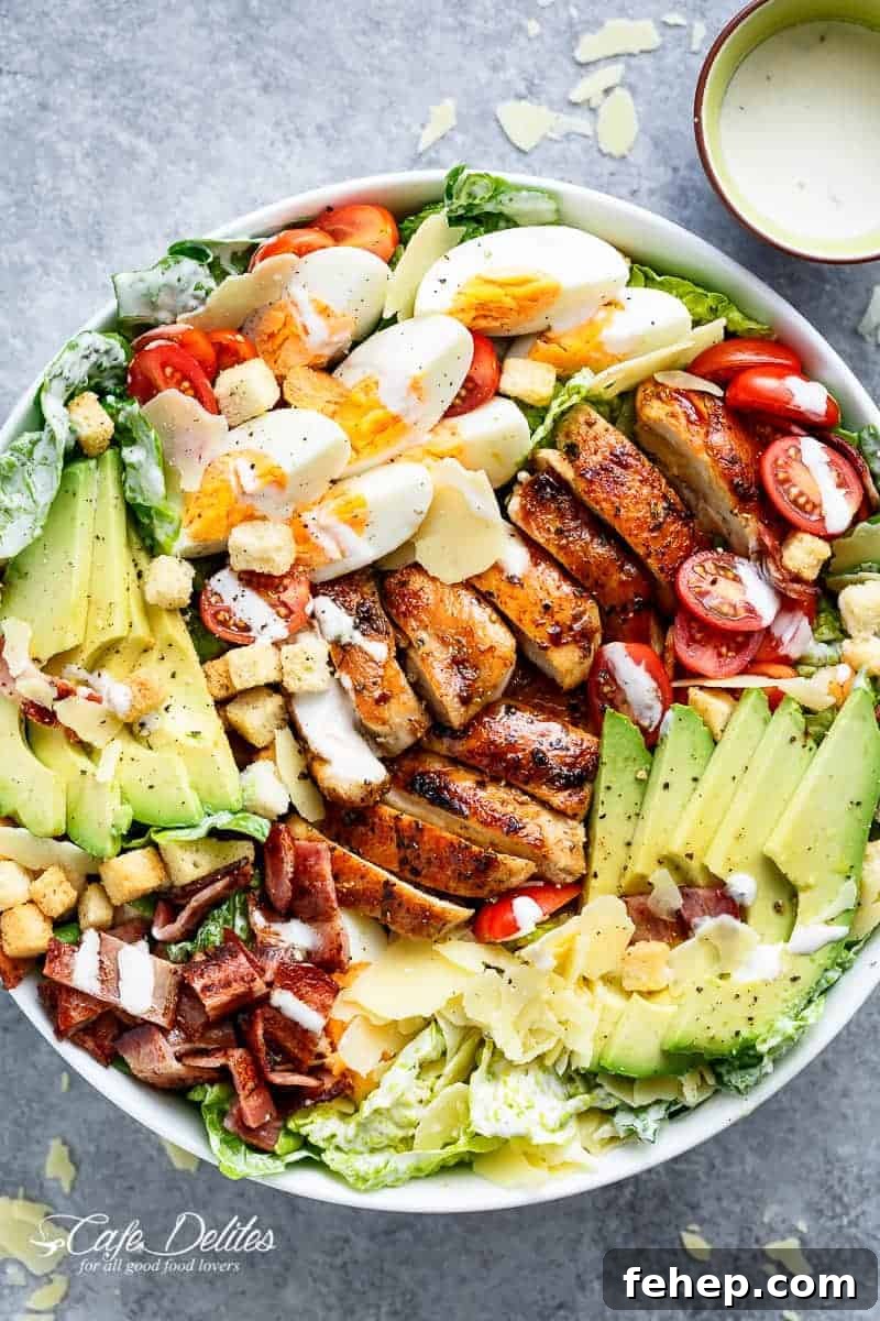Grilled Chicken Cobb Caesar Salad is a meal in a salad, merging two of your favorites into one delicious bowl! Perfect for lunch or dinner!